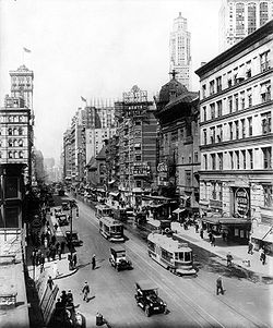 Broadway north from 38th St., New York City, showing the Casino and Knickerbocker Theatres ("Listen, Lester", visible at lower right, played the Knickerbocker from December 23, 1918, to August 16, 1919), a sign pointing to Maxine Elliott's Theatre, which is out of view on 39th Street, and a sign advertising the Winter Garden Theatre, which is out of view at 50th Street. All but the Winter Garden are demolished. The old Metropolitan Opera House and the old Times Tower are visible on the left. Broadway theatres 1920.jpg