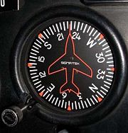 The heading indicator from a Cessna 172.