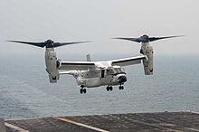 A CMV-22 lands on the deck of the USS Carl Vinson (CVN 70) CNO, Indian Chief of Naval Staff Visit USS Carl Vinson (CVN 70) as part of MALABAR 21 211014-N-RO680-1034.jpg