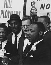 Martin Luther King Jr., president of the Southern Christian Leadership Conference, and Mathew Ahmann, executive director of the National Catholic Conference for Interrracial Justice, at a civil rights march on Washington, D.C. Dr. Martin Luther King Jr. at a civil rights march on Washington D.C. in 1963.jpg