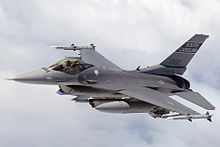 F-16C of the South Carolina Air National Guard in-flight over North Carolina equipped with air-to-air missiles, bomb rack, targeting pods, and electronic countermeasures pods F16 SCANG InFlight.jpg