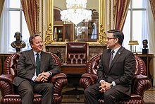 Johnson with British Foreign Secretary David Cameron in December 2023 Foreign Secretary David Cameron visits Washington D.C. (53380776169).jpg