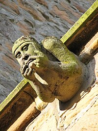 A gargoyle adorning the Dornoch Cathedral in Dornoch, Scotland.