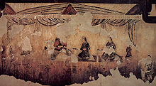 In a mural of Gakjeochong (gagjeocong "Tombs of Wrestlers"), a Goguryeo tomb built around the 5th century shows a Goguryeo nobleman having a meal with two ladies. Goguryeo-Gakjeochong-Inner life.jpg
