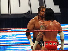Acted intimidation in professional wrestling HHH stares down Punk.jpg