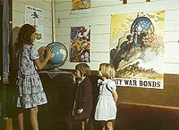 Rural school children in front of homefront posters in San Augustine County, Texas. 1943 Homefront posters.jpg