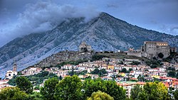 View of the hamlet Latonuovo with the Tower and the Castle, and Mount Taburno on the background