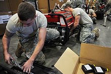 Soldiers with the New York Army National Guard's 206th Military Police Company assembling portable generators New York National Guard - Flickr - The National Guard (5).jpg