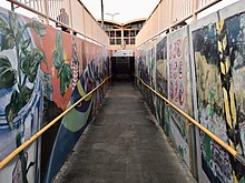 ramp with public art painted on walls