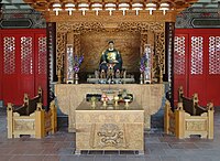 Main altar of the Shrine of Koxinga in Tainan. Statue of Koxinga.jpg