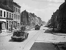 British armoured vehicles passing through Leuven, Belgium, 14 May 1940. The British Army in France and Belgium 1940 F4472.jpg