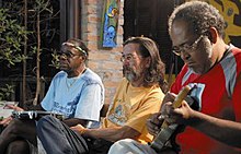 Skowa (third, from left to right) playing with Trio Mocotó in 2012