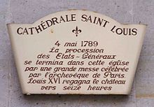 Plaque commémorative apposée sur la façade de la cathédrale et commémorant la procession du 4 mai 1789.