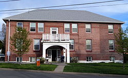 Photograph of the Blackburn Sanitarium, a two-story, brick building