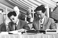 D. N. Aidit and Revang, poring over documents