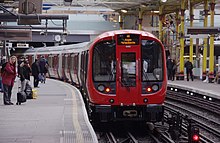 A Metropolitan line S Stock train departing Platform 1 with an Eastbound service to Aldgate Farringdon station MMB 22 S-Stock.jpg