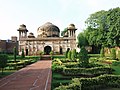 A view of the tomb with the garden in foreground