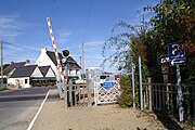 Access to the station is near the level crossing.