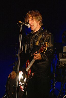 Kristiansen performing live with DumDum Boys at Strandgateparken in Hamar, August 28, 2009.