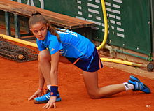 A ball girl at the 2014 French Open in tennis Roland Garros 20140528 Roland Garros ballgirl.jpg