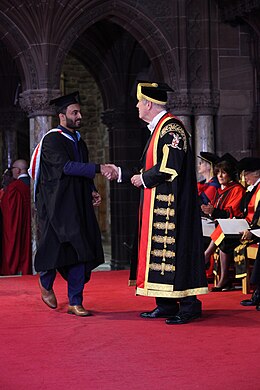 The University of Chester holds its annual graduation ceremony in Chester Cathedral, presided over by the Chancellor Gyles Brandreth Shaheel Graduation felicitation.jpg
