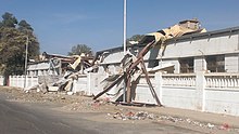 An airstrike in Sana`a on a textile factory in July 2015 left more than 1,300 people unemployed (photo: A. Mojalli/VOA, November 2015) This textile factory was bombed in July leaving more than 1,300 people unemployed Many of the workers are now looking for work as day laborers Sanaa Yemen Nov-2015.jpg