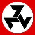 Three-sevens, triskele-tegn for den rasistiske boerbevegelsen Afrikaner Weerstandsbeweging (AWB) i Sør-Afrika. Triskelen her er dannet av tallet «777», «Guds tegn», som skal beseire Dyrets tall «666», formet som et nazikors.
