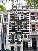 Herenhuis, gebouwd in de trant van het eclecticisme met gepleisterde decoraties uitgevoerd