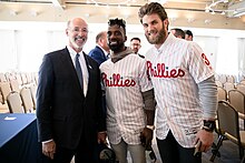 McCutchen with Governor Tom Wolf and Phillies teammate Bryce Harper in 2019 Wolf McCutchen Harper (32686597377).jpg