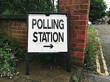 Sign outside a polling station in London on the morning of the referendum Brexit (27240041144).jpg