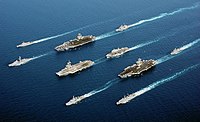 Four modern aircraft carriers of various types �  USS John C. Stennis, Charles de Gaulle, HMS Ocean and USS John F. Kennedy � and escort vessels on operations in 2002