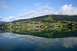 View of the village from the southern shore of the lake Hafslovatnet