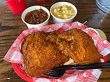 Half-chicken at Hattie B's with side of baked beans and mac & cheese