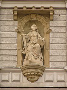 Lady Justice--the allegory of justice--statue at court building in Olomouc, Czech Republic Justice statue.jpg