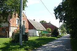 Houses by the roadside in Komorówko