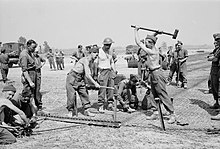 RAF construction workers finishing the construction of an airfield near Lingevres in 1944 Royal Air Force 1939-1945- Fighter Command CL709.jpg