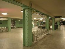 Station with pillars painted green
