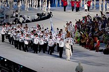 Photographie de l'entrée de la délégation sud-coréenne lors de la cérémonie d'ouverture.