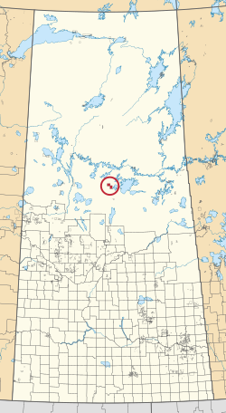 A map of the province of Saskatchewan showing 297 rural municipalities and hundreds of small Indian reserves. One is highlighted with a red circle.