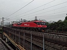 Two China Railway HXD3Ds hauling a long-distance passenger train. China Railways HXD3D 0250 & HXD3D 0496 20180511 01.jpg