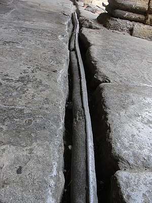 Lead pipe in Roman bath in Bath, Somerset, Eng...