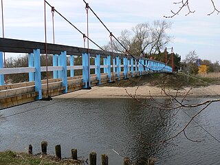 The pedestrian bridge over the river Sventoji at Sventoji resort