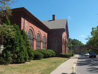 Philadelphia Water Department Belmont Pumping Station, built 1900, Martin Luther King, Jr., Drive at Montgomery Drive, Philadelphia, PA. View from the parking lot, looking north, with the Columbia Railroad Bridge in the background. Phila Belmont Pumping Startion02.png