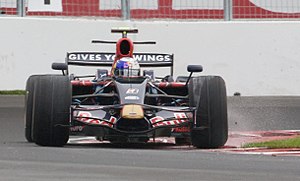 Sebastian Vettel driving for Scuderia Toro Ros...