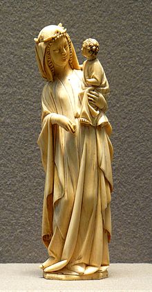 French ivory Virgin and Child, end of 13th century, 25 cm high, curving to fit the shape of the ivory tusk Vierge a l'Enfant debout.jpg