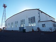 The Winslow–Lindbergh Regional Airport Hanger was built in 1929 and is located in 701 Airport Road. The airport was originally called the Barringan Airport. Both the airport and hanger were built by the Transcontinential Air Transport in 1929. The airport is named in honor of Charles Lindbergh who flew the inaugural flight into Winslow for Transcontinential Air Transport (TAT) that same year 1929. The airport is dedicated to the memory of Melvin L. Kislingbury, a Winslow resident who was killed in a WW II flight mission in Louisiana in 1943.