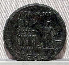 Coin of Emperor Caligula showing several Aquilae at the left.