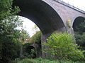 East-west beneath north–south: Camerton branch viaduct (left) dwarfed by Somerset and Dorset Joint Railway viaduct at Midford