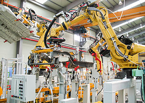 Bras robotique dans une ligne de montage automobile