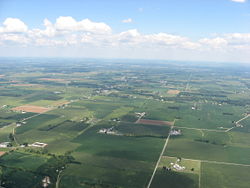 Countryside surrounding North Hampton, with the village in the distance